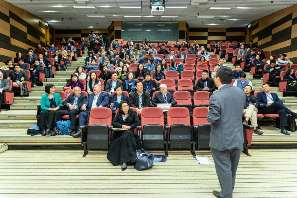 Source: Pexels
People sitting and listening to the lecturer.